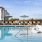 A outdoor swimming pool with chairs 
